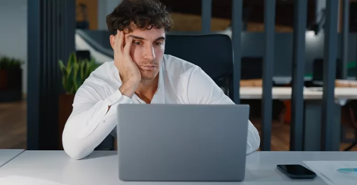 Businessperson unmotivated to make sales