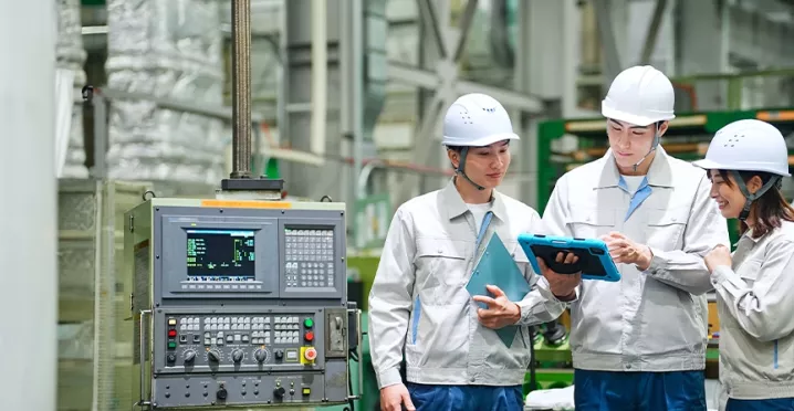 manufacturing employees enjoying engagement software