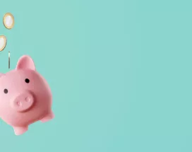 Shows a piggy bank with coins floating above it
