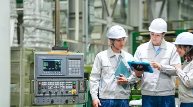 manufacturing employees enjoying engagement software