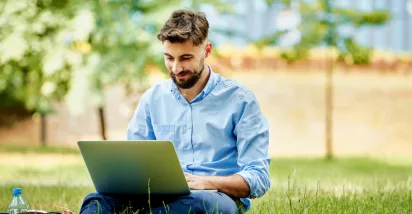 An employee enjoying working outside during the summer