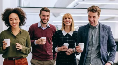 group walking with coffee