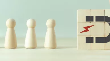 A photo that shows a magnet drawing in figures of people