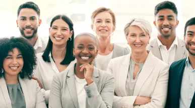 A group of employee smiling