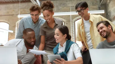 Team collaborating around a table at work